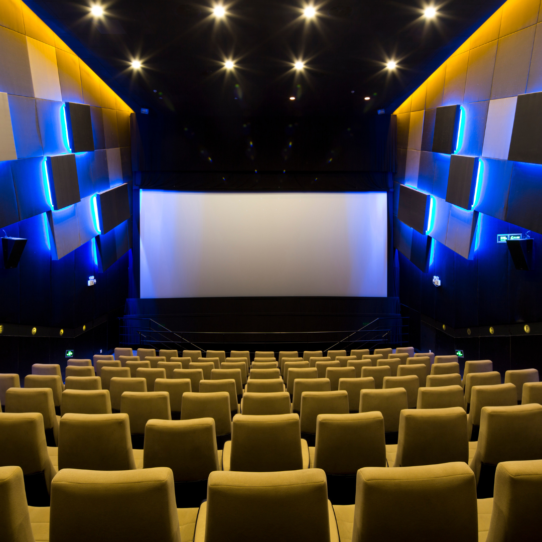 Cinema theater with yellow auditorium seating.