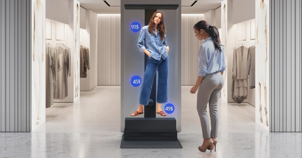 Hypervsn Holographic retail display showing a woman in womens clothing.