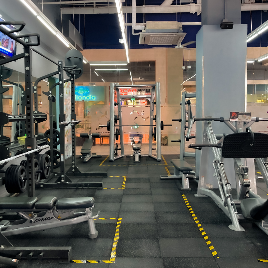Gym with TV's and sound systems playing